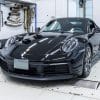 Porsche on a dyno getting a custom tuning