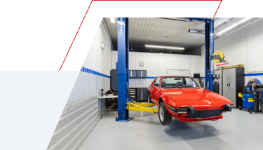 Vintage Fiat x19 getting a full detailing on a lift