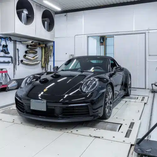 Porsche on a dyno getting a custom tuning