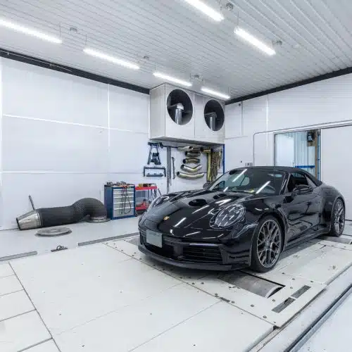 Porsche on a dyno getting a testing and custom tuning