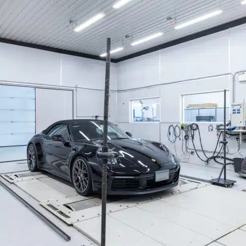 Porsche on a dyno getting a custom tuning