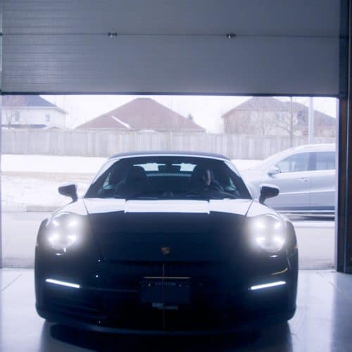 Porsche pulling into maintenance area from outside